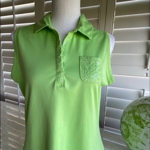 WOMAN’S IZOD PERFORM X  polo /  detail on pocket